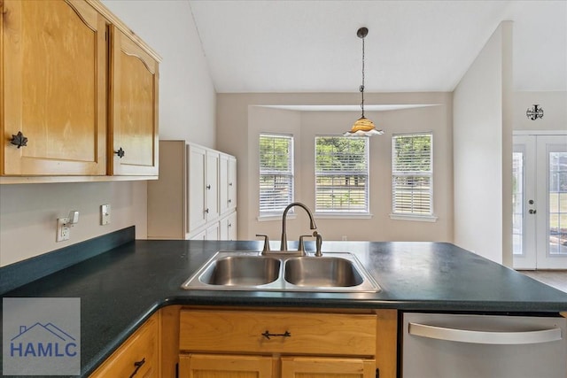 102 Penny Ln, Guyton, GA 31312 - kitchen featuring a sink, stainless steel dishwasher, dark countertops, hanging light fixtures, and vaulted ceiling
