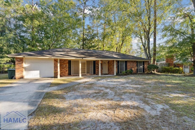 ranch-style house featuring a garage