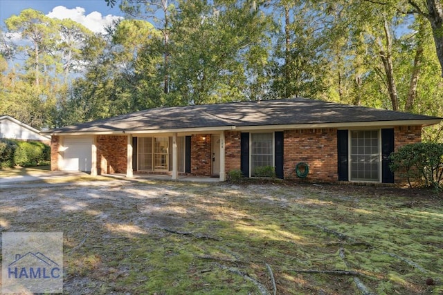 single story home with a garage