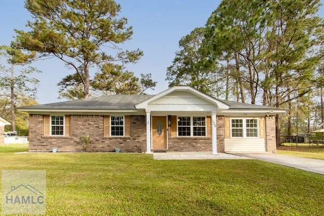 130 Melrose Pl, Rincon, GA 31326 - single story home featuring driveway, a front yard, and brick siding