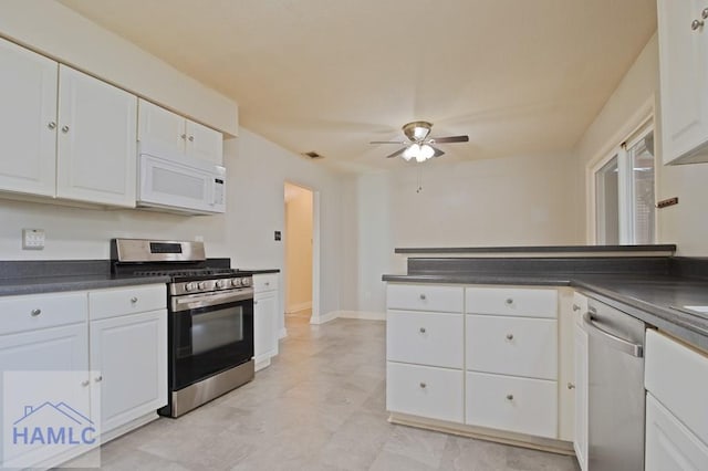 130 Melrose Pl, Rincon, GA 31326 - kitchen featuring white cabinetry, dark countertops, a ceiling fan, and appliances with stainless steel finishes
