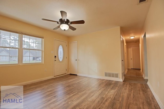 130 Melrose Pl, Rincon, GA 31326 - entryway with baseboards, visible vents, and wood finished floors