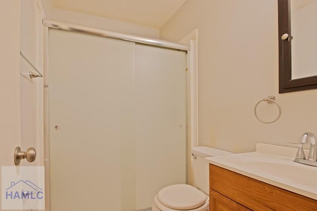 130 Melrose Pl, Rincon, GA 31326 - bathroom with toilet, vanity, and a shower with shower door