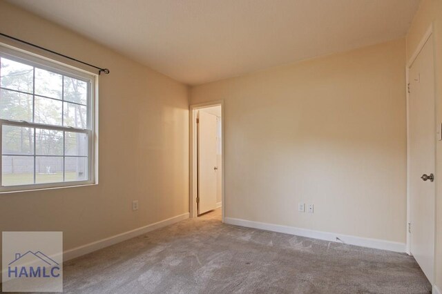 130 Melrose Pl, Rincon, GA 31326 - unfurnished bedroom featuring baseboards and carpet floors