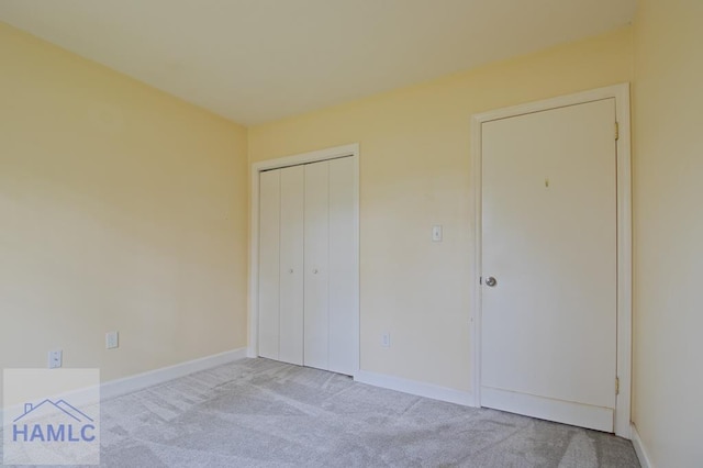 130 Melrose Pl, Rincon, GA 31326 - unfurnished bedroom featuring a closet, carpet, and baseboards