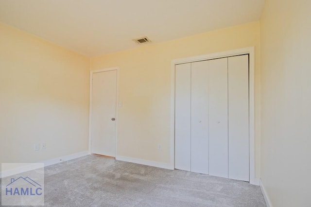 130 Melrose Pl, Rincon, GA 31326 - unfurnished bedroom with baseboards, carpet, a closet, and visible vents