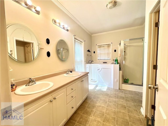 bathroom with crown molding, vanity, and shower with separate bathtub