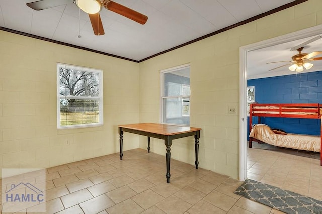 interior space featuring light tile patterned floors and crown molding