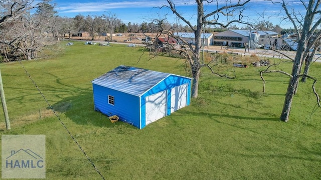 view of outdoor structure with a yard