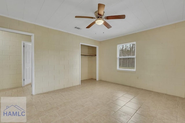 unfurnished bedroom featuring ceiling fan