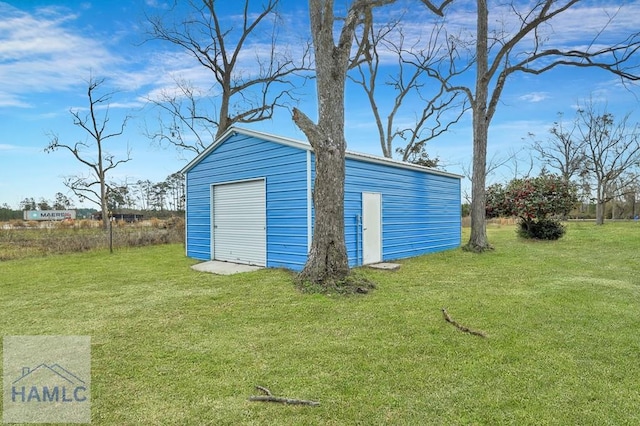 garage with a yard