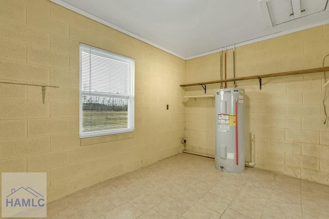 utility room featuring electric water heater