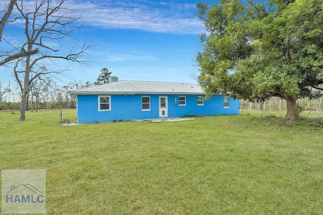 ranch-style home with a front yard