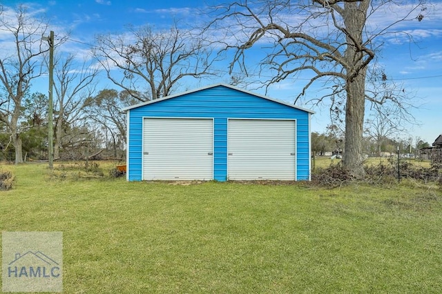 garage with a lawn