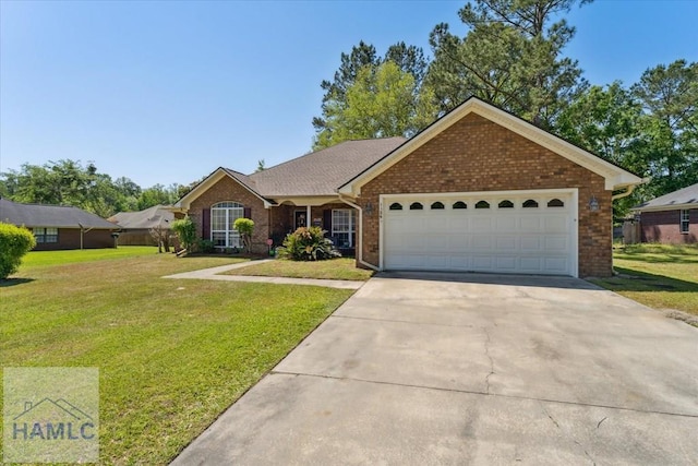 ranch-style home featuring a garage, driveway, a front lawn, and brick siding