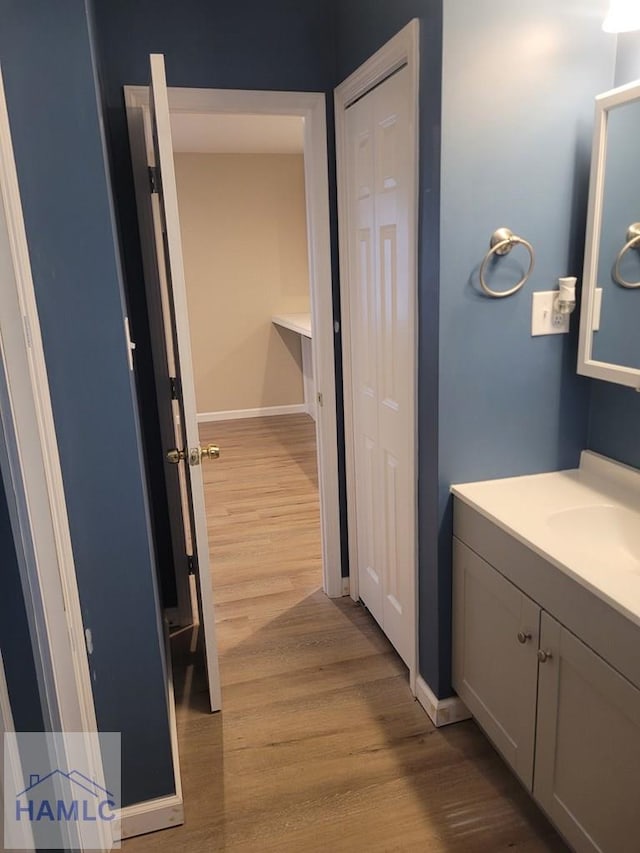 2922 7th St, Columbus, GA 31906 - bathroom with wood finished floors and vanity