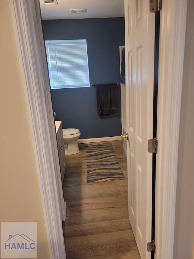 2922 7th St, Columbus, GA 31906 - bathroom featuring vanity and wood finished floors