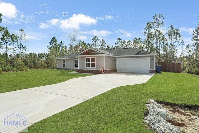 ranch-style house with a garage, a front lawn, driveway, and fence