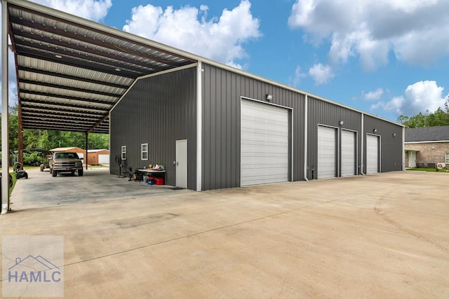 garage with a carport