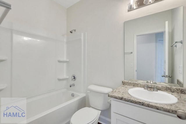 full bathroom featuring vanity, toilet, and tub / shower combination