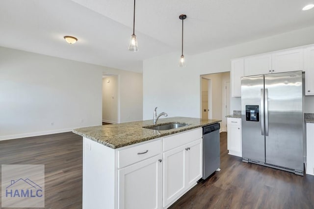 kitchen featuring white cabinetry, sink, hanging light fixtures, and appliances with stainless steel finishes