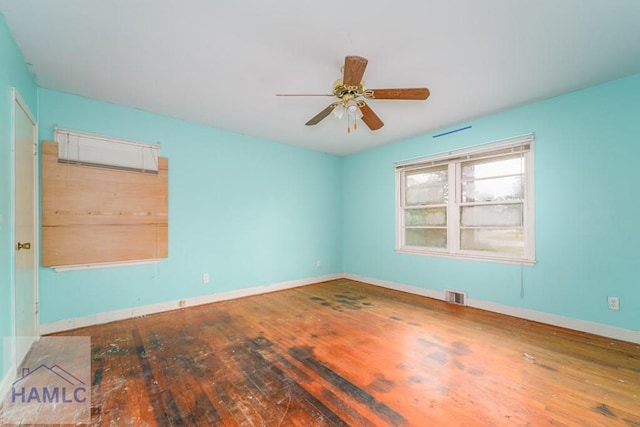 153 Drennon Dr, Jesup, GA 31545 - spare room featuring hardwood / wood-style flooring, baseboards, and ceiling fan