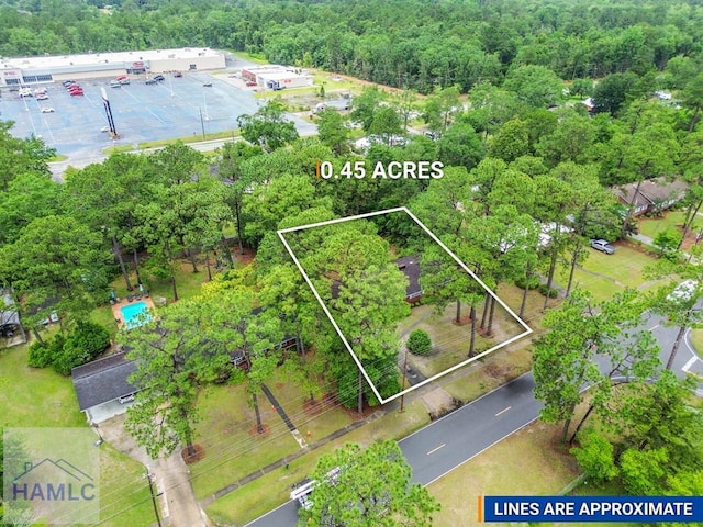 153 Drennon Dr, Jesup, GA 31545 - view of property location with property parcel outlined and a heavily wooded area