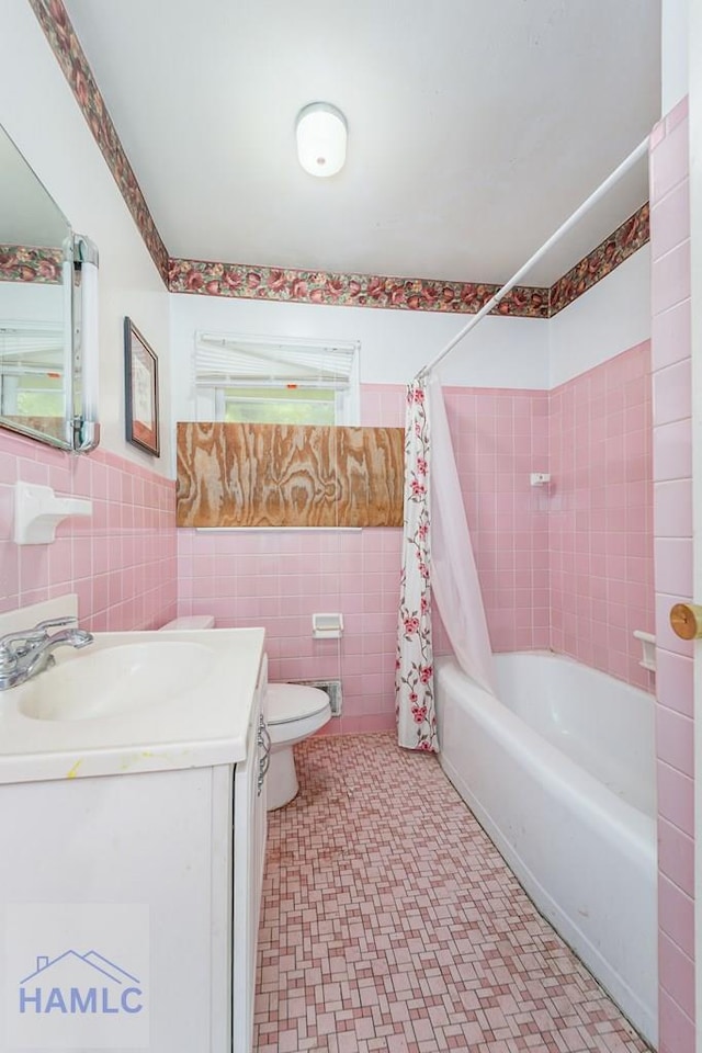 153 Drennon Dr, Jesup, GA 31545 - full bath featuring tile walls, vanity, toilet, shower / bath combination with curtain, and tile patterned floors