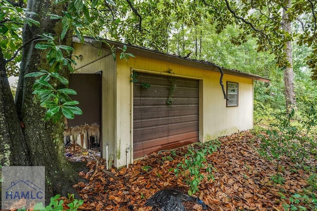 153 Drennon Dr, Jesup, GA 31545 - view of outbuilding with a garage