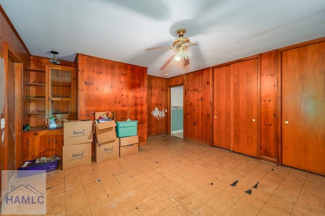 153 Drennon Dr, Jesup, GA 31545 - unfurnished office with tile patterned floors, a ceiling fan, and wood walls