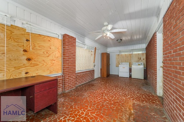 153 Drennon Dr, Jesup, GA 31545 - interior space featuring washer and dryer, brick wall, and wood walls