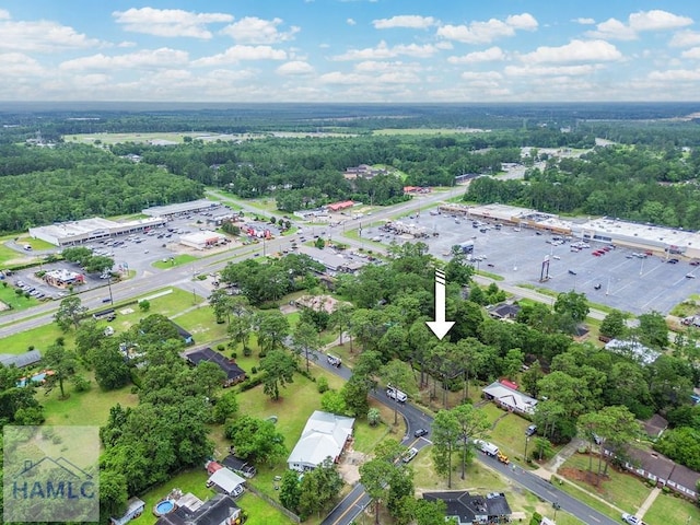153 Drennon Dr, Jesup, GA 31545 - aerial overview of property's location featuring a heavily wooded area