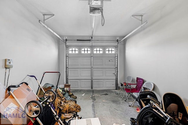 garage featuring a garage door opener