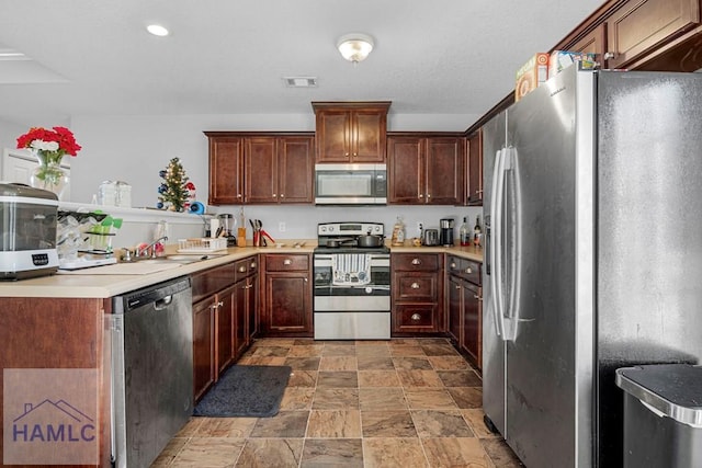 kitchen featuring sink and stainless steel appliances