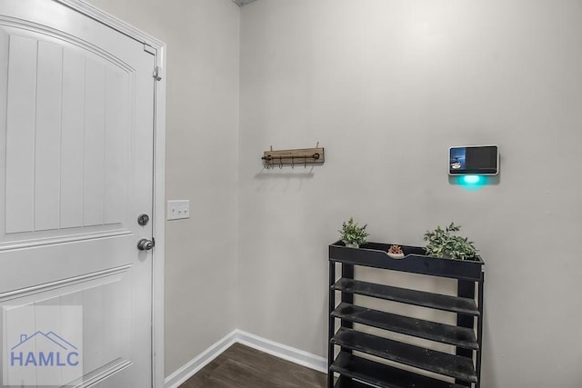 26 Sunflower Cir, Ludowici, GA 31316 - entryway with baseboards and dark wood finished floors