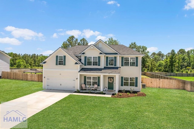 26 Sunflower Cir, Ludowici, GA 31316 - view of front facade with a garage, concrete driveway, and central AC
