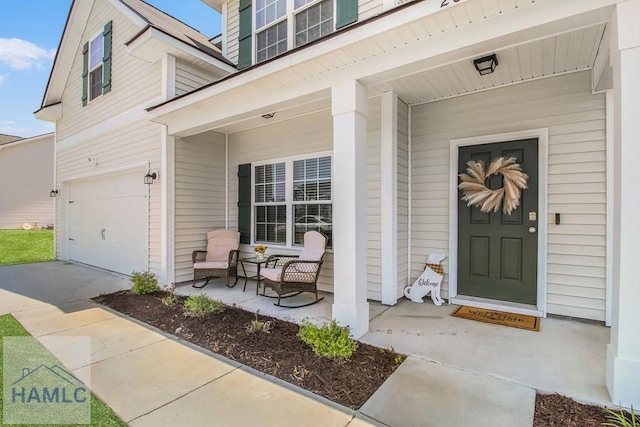 26 Sunflower Cir, Ludowici, GA 31316 - entrance to property featuring covered porch, an attached garage, and concrete driveway