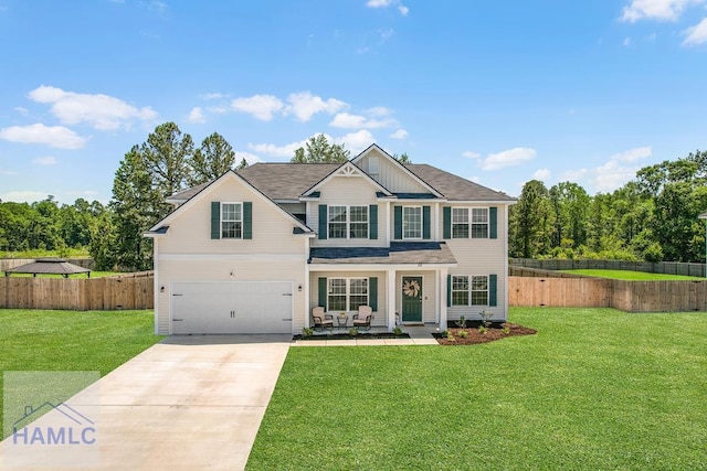 26 Sunflower Cir, Ludowici, GA 31316 - view of front of property featuring driveway, a garage, and board and batten siding