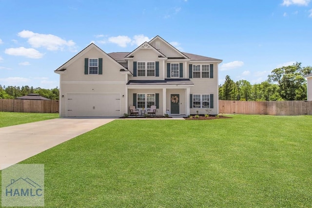 26 Sunflower Cir, Ludowici, GA 31316 - view of front facade featuring concrete driveway, a porch, a garage, and board and batten siding