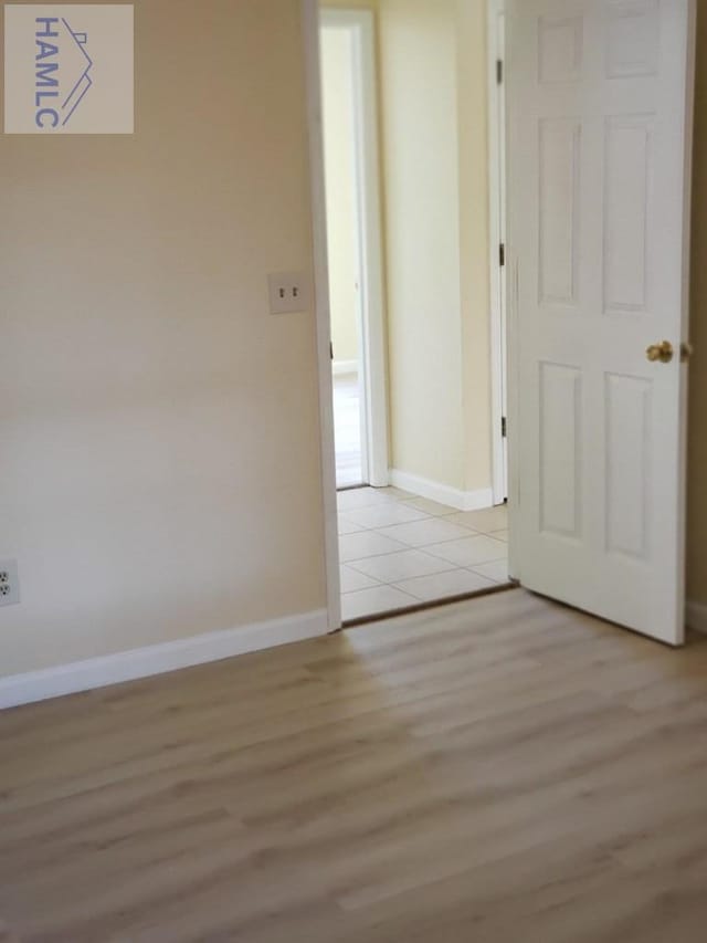 spare room with light hardwood / wood-style floors