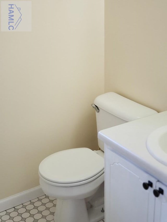 bathroom with vanity and toilet