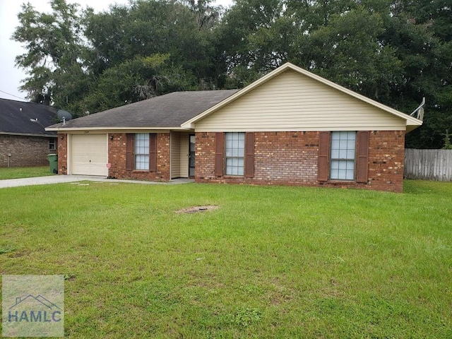 ranch-style home with a garage and a front lawn