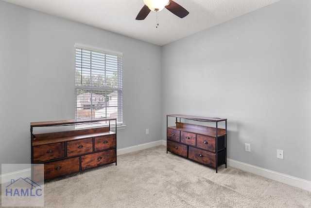 42 Kinlock Ct, Midway, GA 31320 - carpeted bedroom with baseboards and ceiling fan