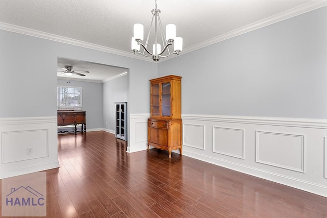 42 Kinlock Ct, Midway, GA 31320 - spare room featuring a chandelier, a wainscoted wall, crown molding, wood finished floors, and ceiling fan
