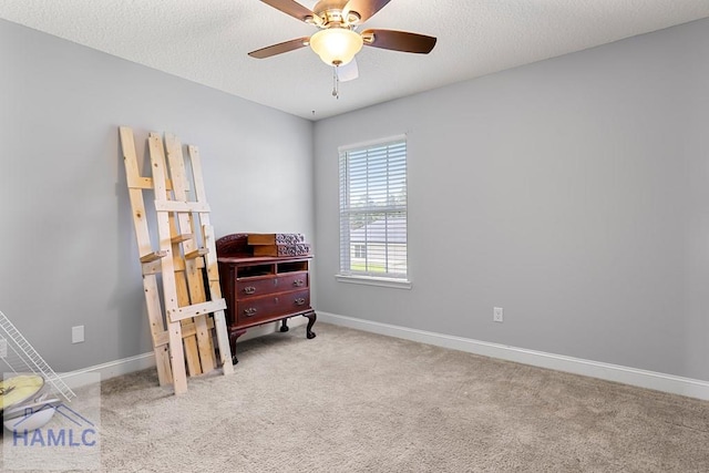 42 Kinlock Ct, Midway, GA 31320 - sitting room featuring light carpet, ceiling fan, and a textured ceiling