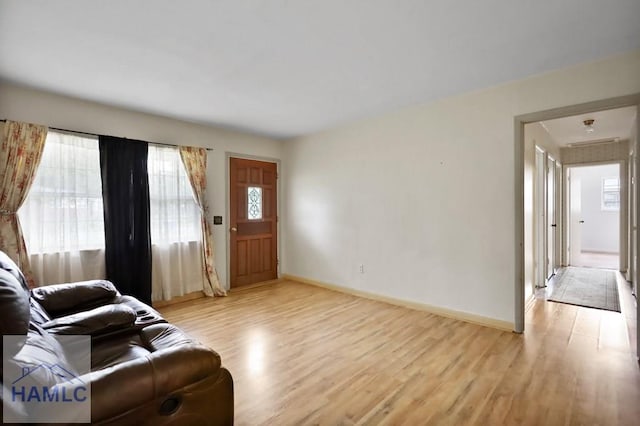 985 Seven Oaks Rd, Jesup, GA 31546 - living room with light wood-style flooring and baseboards