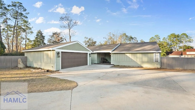 single story home featuring a garage