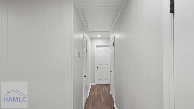 hallway with dark wood-type flooring