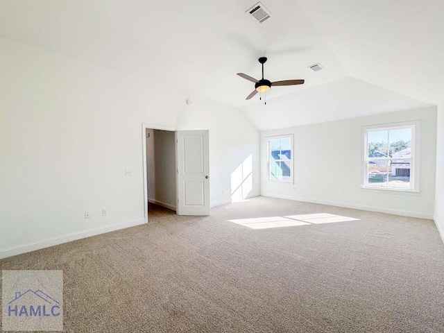 interior space featuring vaulted ceiling and ceiling fan