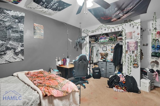 carpeted bedroom with a ceiling fan